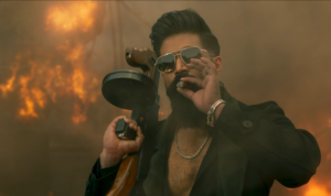 Yash as Raya in Toxic movie teaser holding gun and walking through smoke”