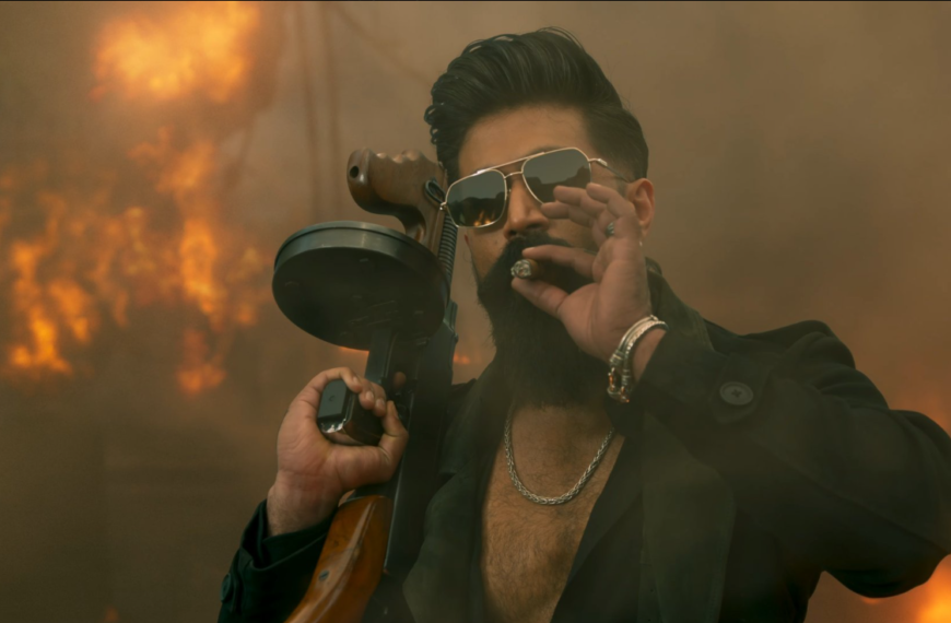 Yash as Raya in Toxic movie teaser holding gun and walking through smoke”