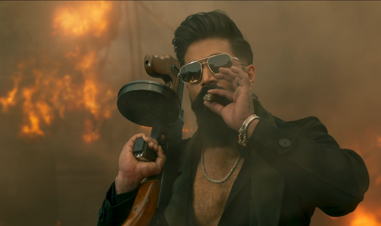 Yash as Raya in Toxic movie teaser holding gun and walking through smoke”